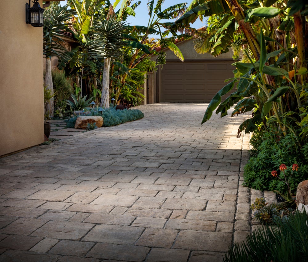 Paver Driveway vs Concrete: Cost, Durability & Appearance Compared