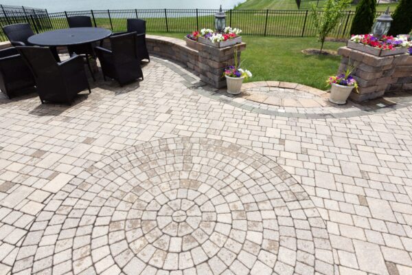 Ornamental,Brick,Paved,Outdoor,Patio,With,A,Circular,Design,In